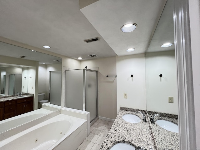 full bathroom with shower with separate bathtub, vanity, toilet, and tile patterned floors