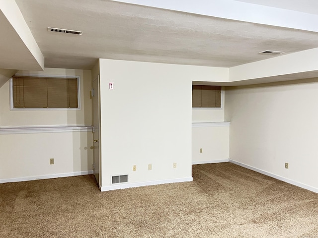 basement with carpet floors