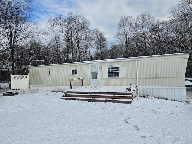 view of snow covered property