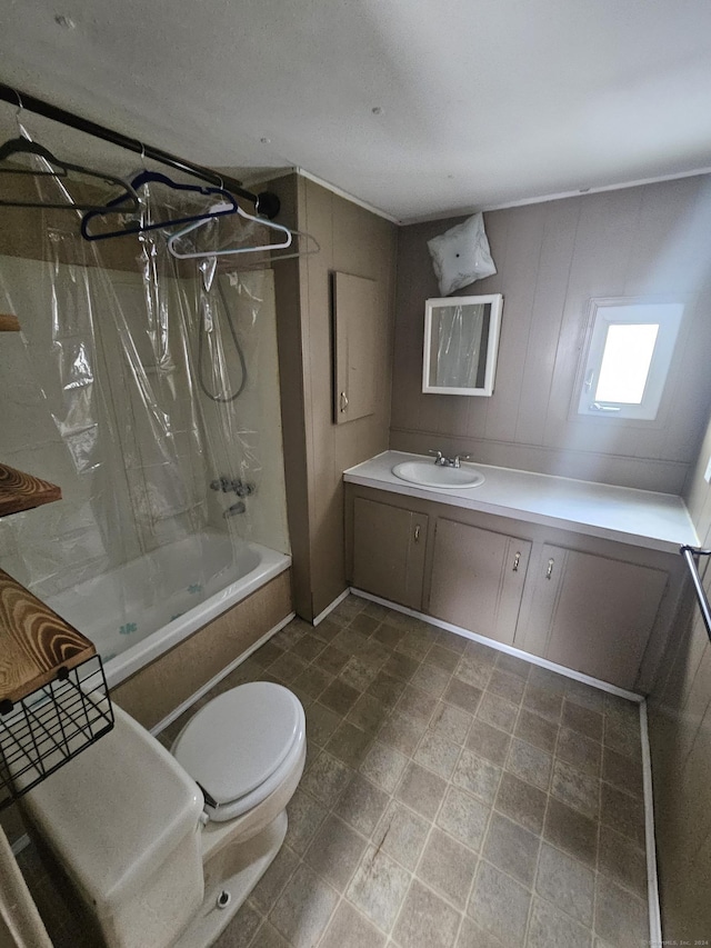 full bathroom featuring vanity, toilet, and shower / tub combo with curtain