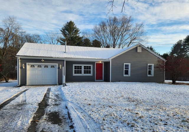 single story home with a garage