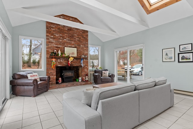 tiled living room with beam ceiling, a skylight, a wealth of natural light, and high vaulted ceiling