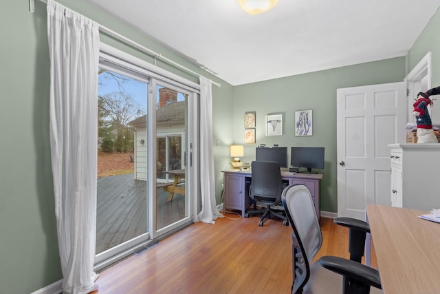 office area featuring light hardwood / wood-style flooring