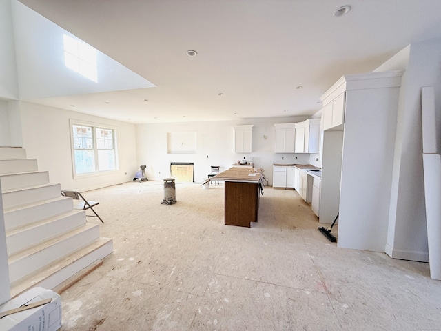 kitchen with white cabinets and a kitchen island