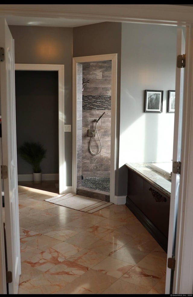 1461 Bunker Hill Rd, Watertown, CT 06795 - bathroom featuring marble finish floor, tiled shower, vanity, and baseboards