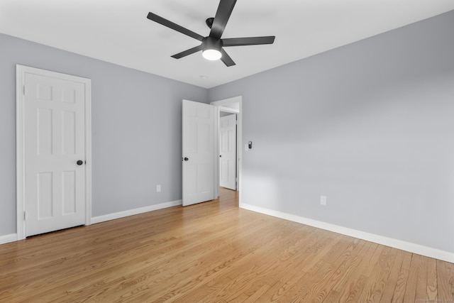 unfurnished bedroom with light wood-type flooring and ceiling fan