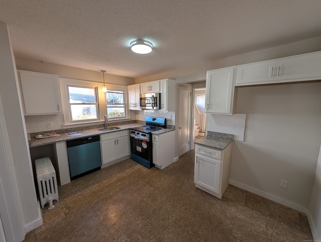 kitchen featuring tasteful backsplash, white cabinetry, and stainless steel appliances