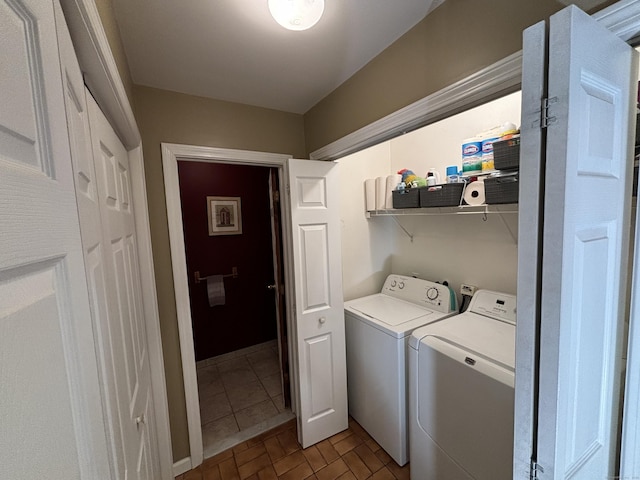 laundry room with washer and clothes dryer