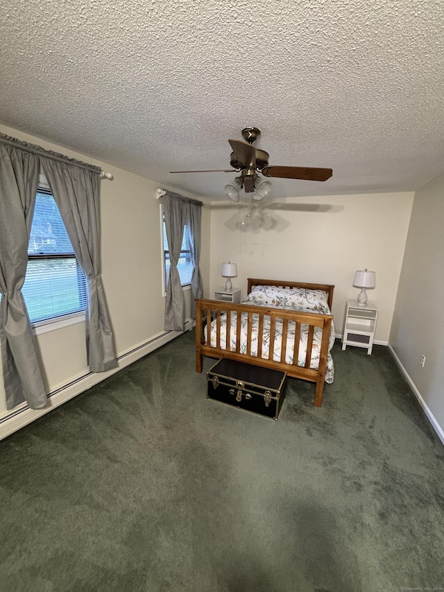 carpeted bedroom with ceiling fan, a textured ceiling, and multiple windows