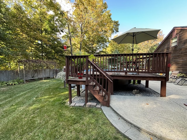 view of yard featuring a wooden deck