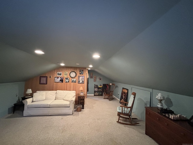 interior space featuring wooden walls and lofted ceiling