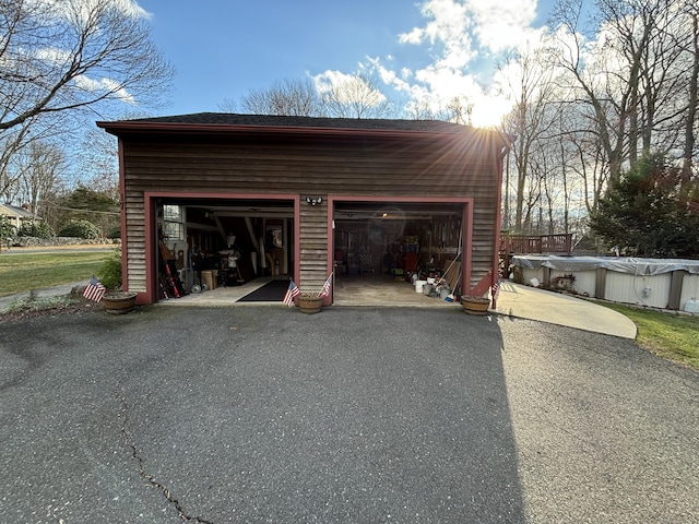 garage featuring a covered pool