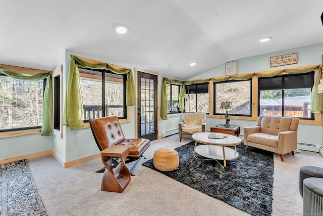 living room with light carpet, vaulted ceiling, and a healthy amount of sunlight