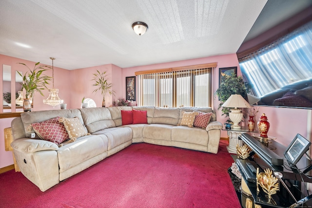 carpeted living room with a textured ceiling