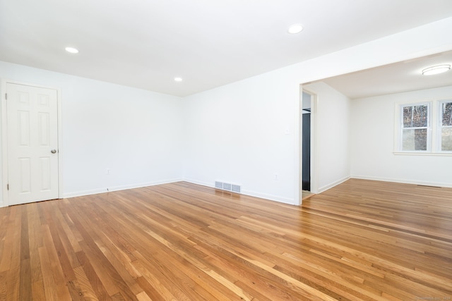 empty room featuring hardwood / wood-style floors