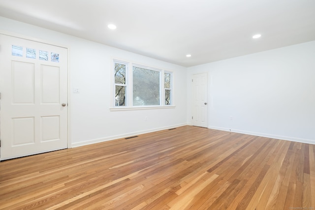 foyer entrance featuring light hardwood / wood-style flooring