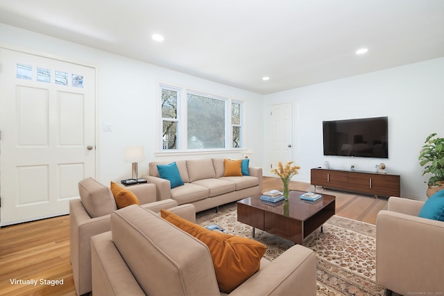 living room featuring light wood-type flooring