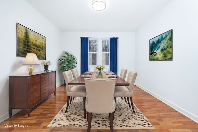 dining space featuring light hardwood / wood-style flooring