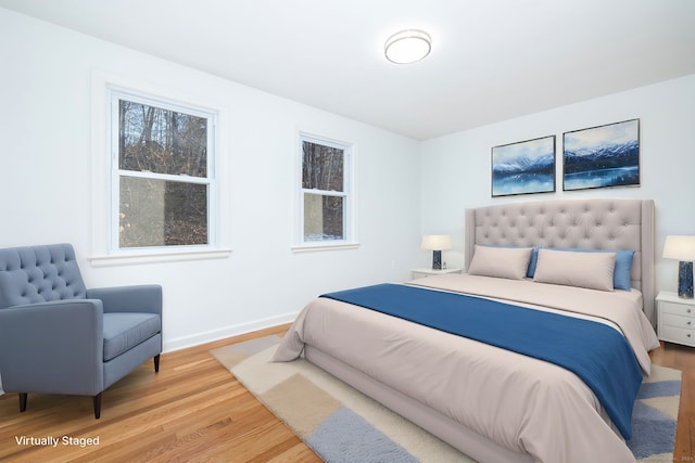 bedroom featuring wood-type flooring