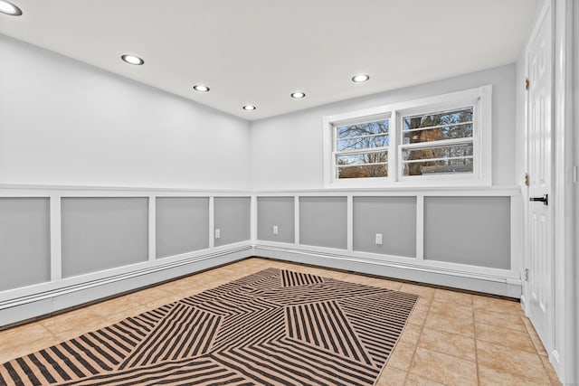 spare room with light tile patterned floors