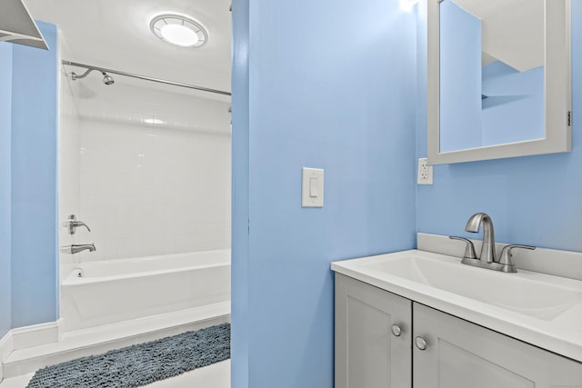 bathroom with vanity and tub / shower combination