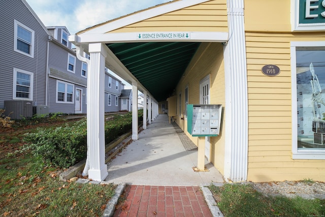 view of parking featuring a mail area