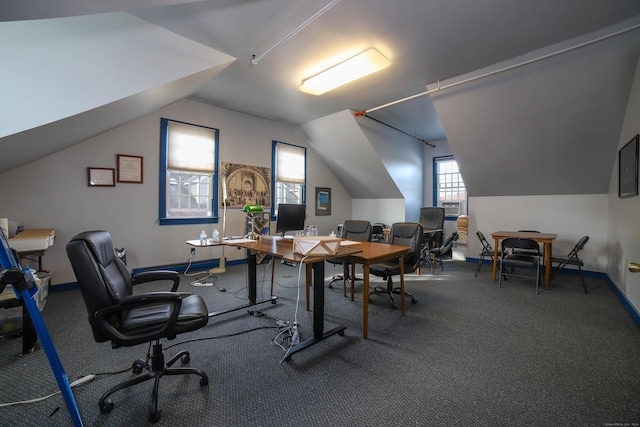 home office with carpet flooring and lofted ceiling