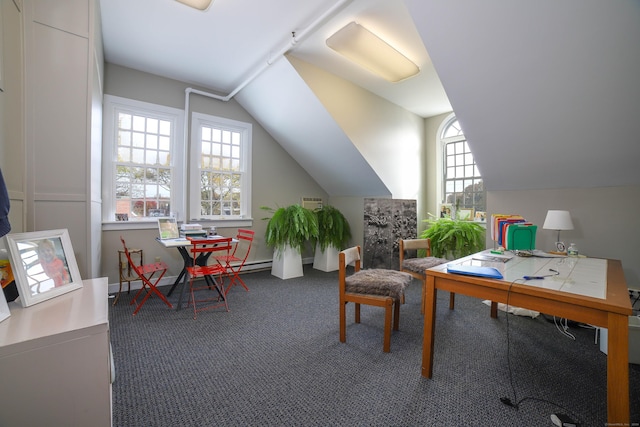 playroom with dark carpet and vaulted ceiling