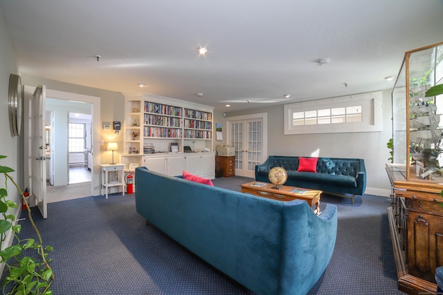 living room with carpet flooring and french doors