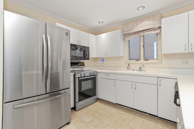 kitchen featuring white cabinetry, sink, crown molding, and appliances with stainless steel finishes