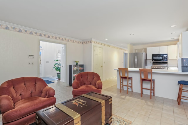 living room featuring ornamental molding and beverage cooler