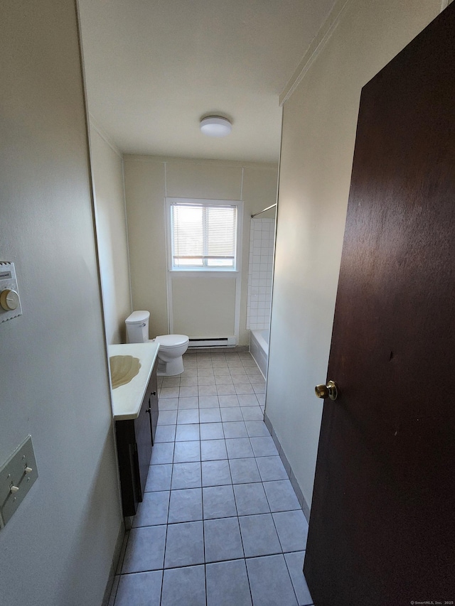 bathroom with tile patterned flooring, a baseboard heating unit, toilet, walk in shower, and vanity