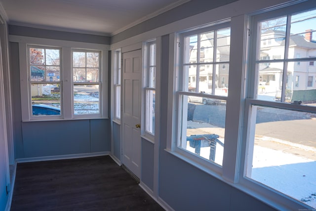 unfurnished sunroom with a healthy amount of sunlight