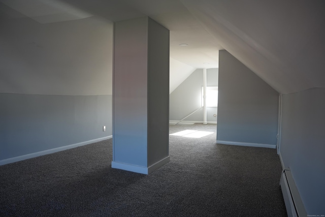 bonus room with lofted ceiling, carpet floors, and a baseboard heating unit