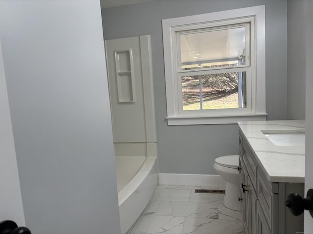 bathroom with vanity and toilet