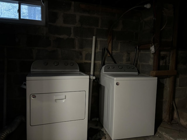 laundry area with washing machine and dryer