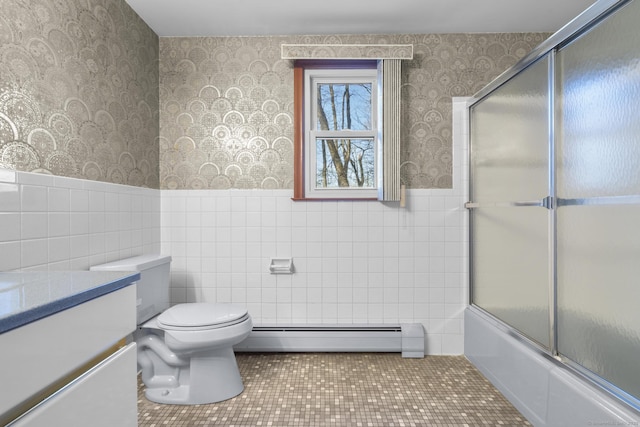 bathroom featuring a wainscoted wall, baseboard heating, tile patterned flooring, and wallpapered walls