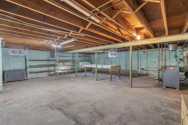 basement featuring heating fuel and a heating unit