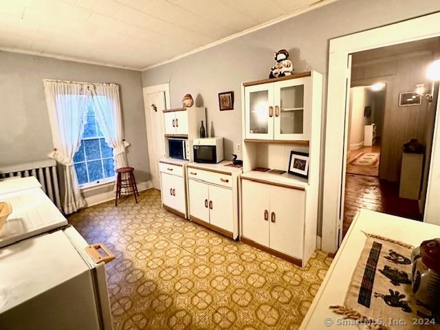 bedroom with crown molding