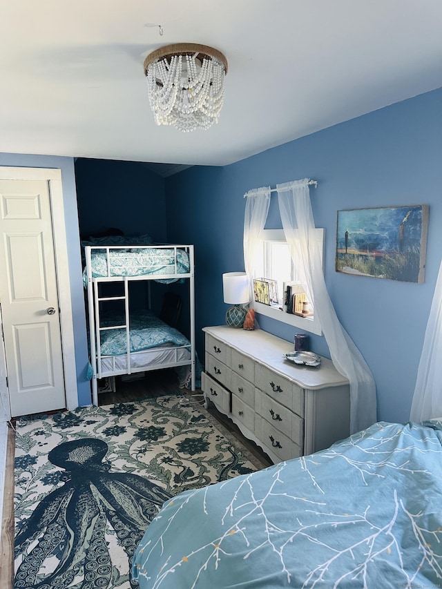 bedroom featuring a chandelier