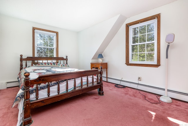 bedroom with carpet floors and baseboard heating