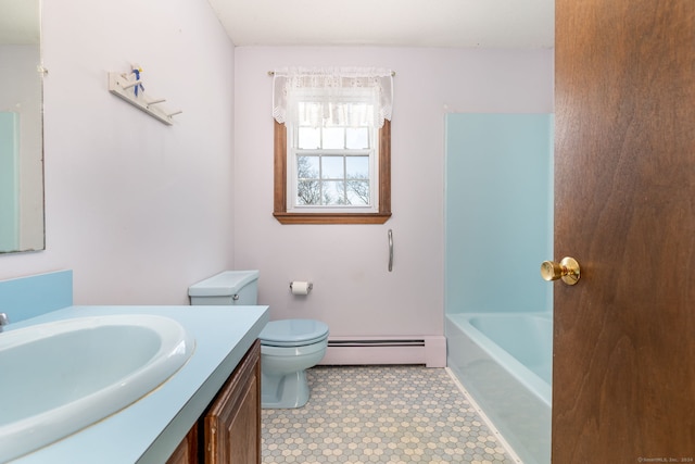 bathroom with vanity, a bath, tile patterned floors, toilet, and baseboard heating