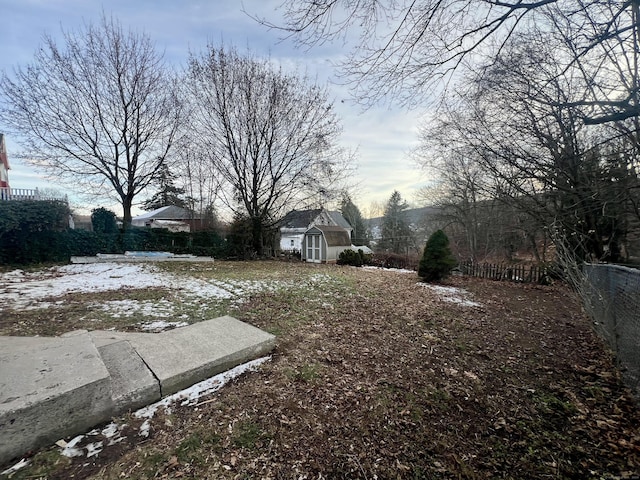 view of yard covered in snow