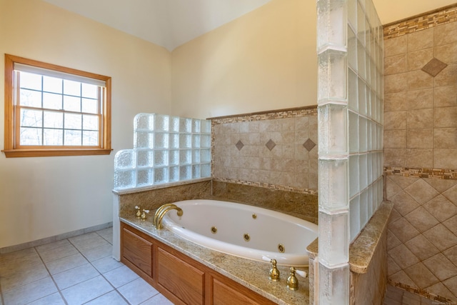 bathroom with tile patterned flooring and independent shower and bath