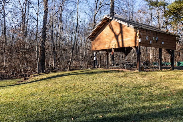 view of home's community with a lawn