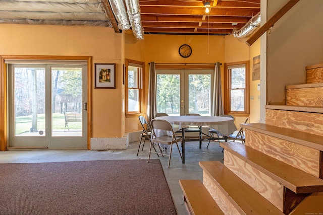 dining space featuring concrete flooring