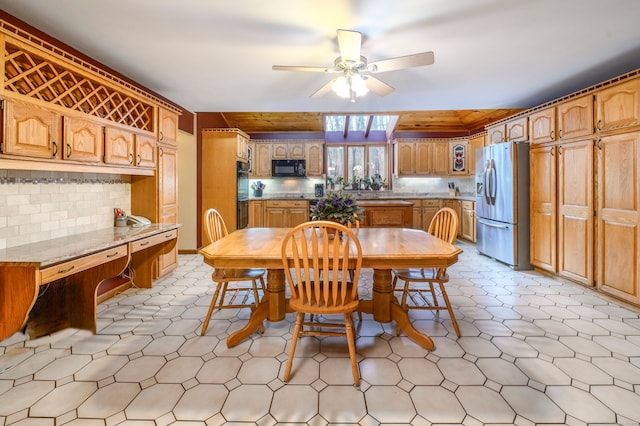 dining space with ceiling fan