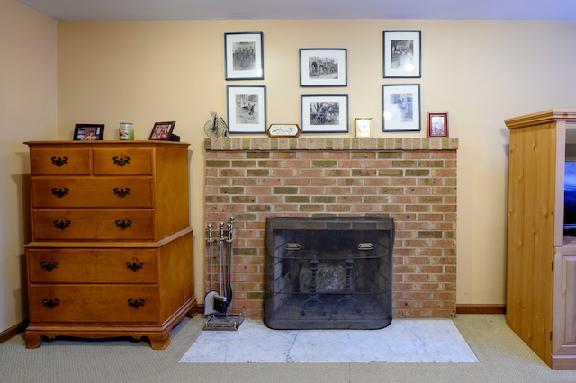 details featuring carpet flooring and a brick fireplace