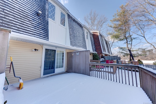 view of snow covered deck