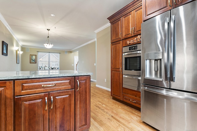 kitchen with light stone countertops, appliances with stainless steel finishes, crown molding, light hardwood / wood-style flooring, and hanging light fixtures